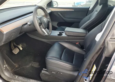 2024 Tesla Model Y from USA, damaged, VIN 7SAYGDED7RF112734